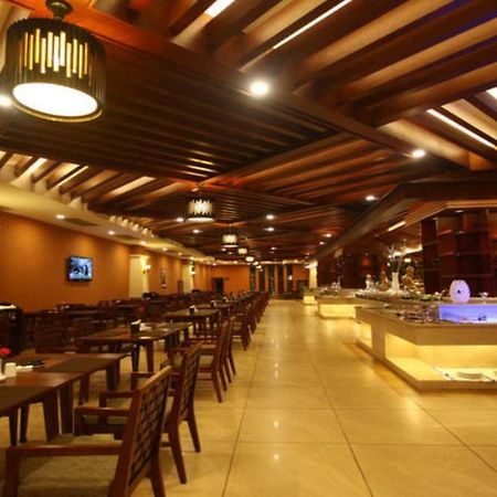 Hotel Ramada Plaza Xishuangbanna Extérieur photo