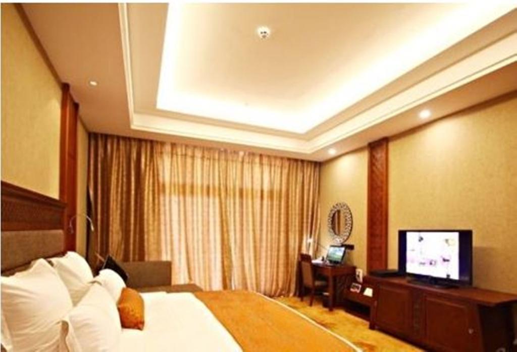 Hotel Ramada Plaza Xishuangbanna Extérieur photo